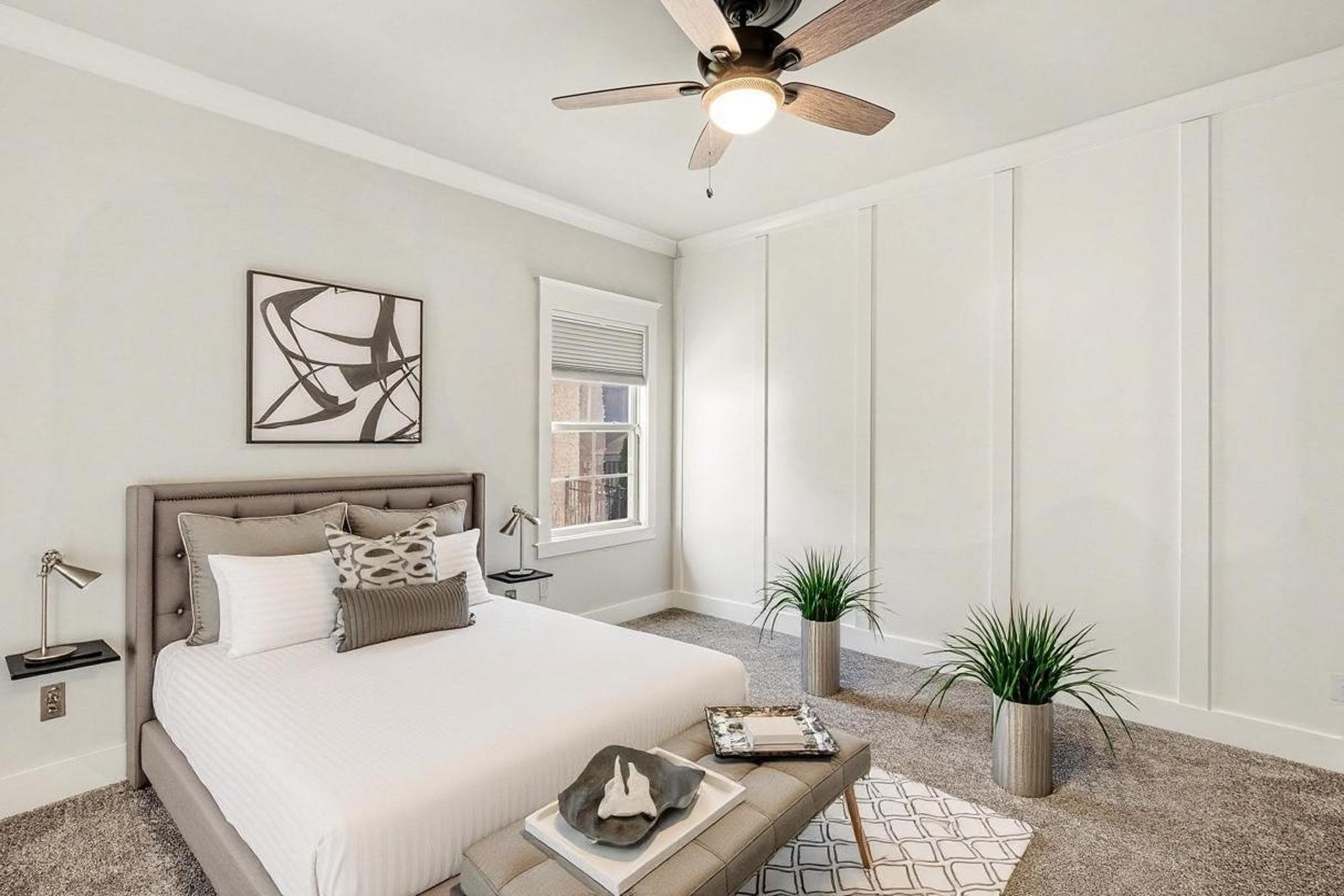 3008 Turnstone Trace Spring Hill, TN 37174 - Photo 22 of 30 a bed sitting in a spacious bedroom next to a window and a potted plant