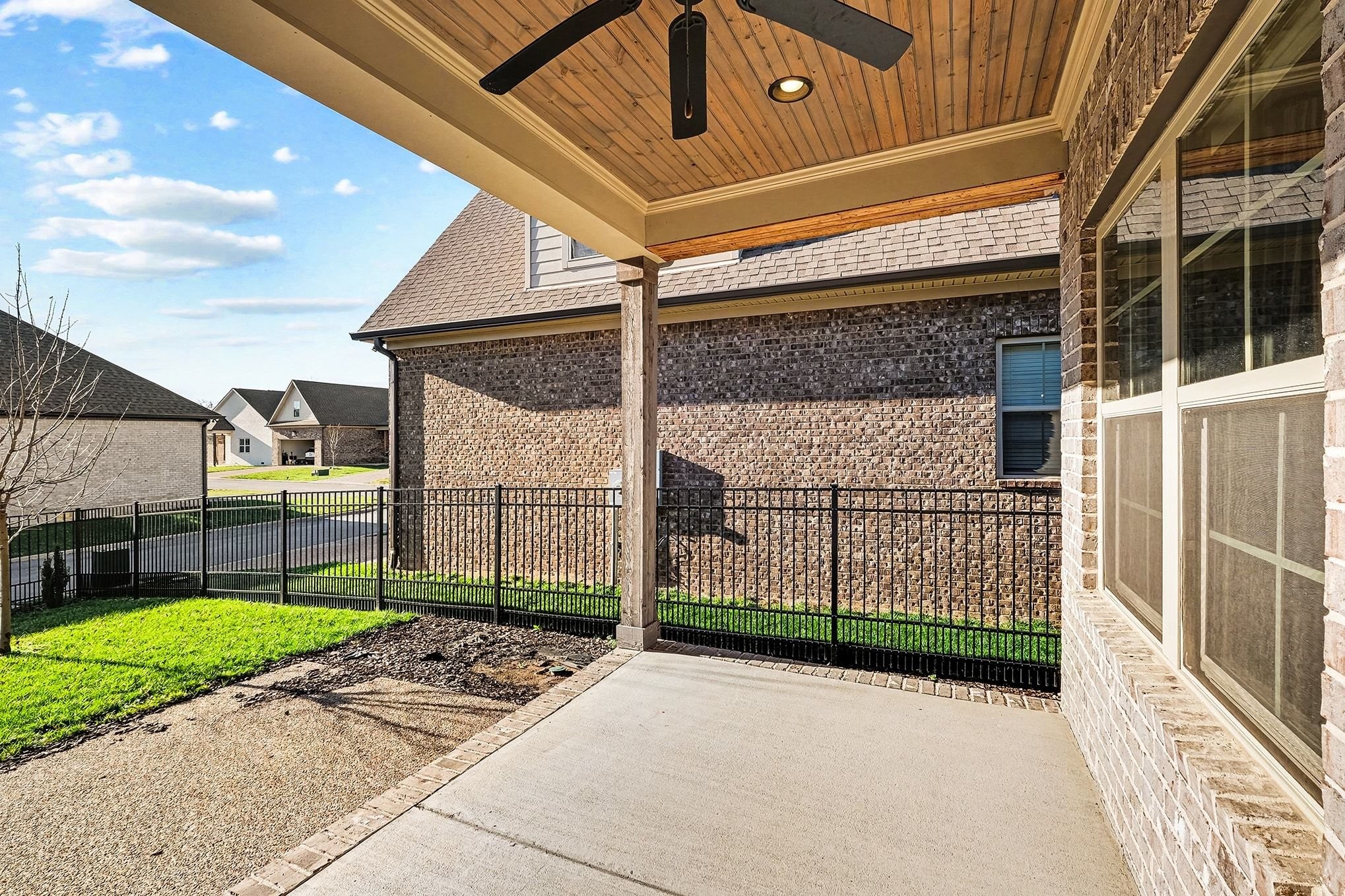 3008 Turnstone Trace Spring Hill, TN 37174 - Photo 28 of 30 a view of a entrance gate of a house with a garden