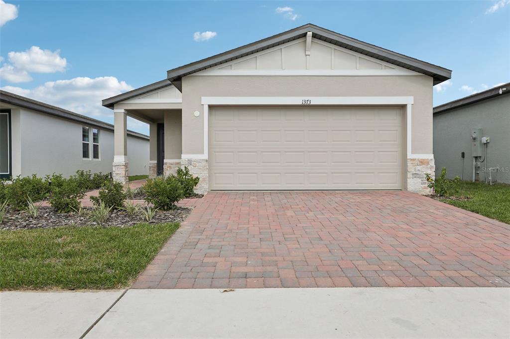 a front view of house with yard