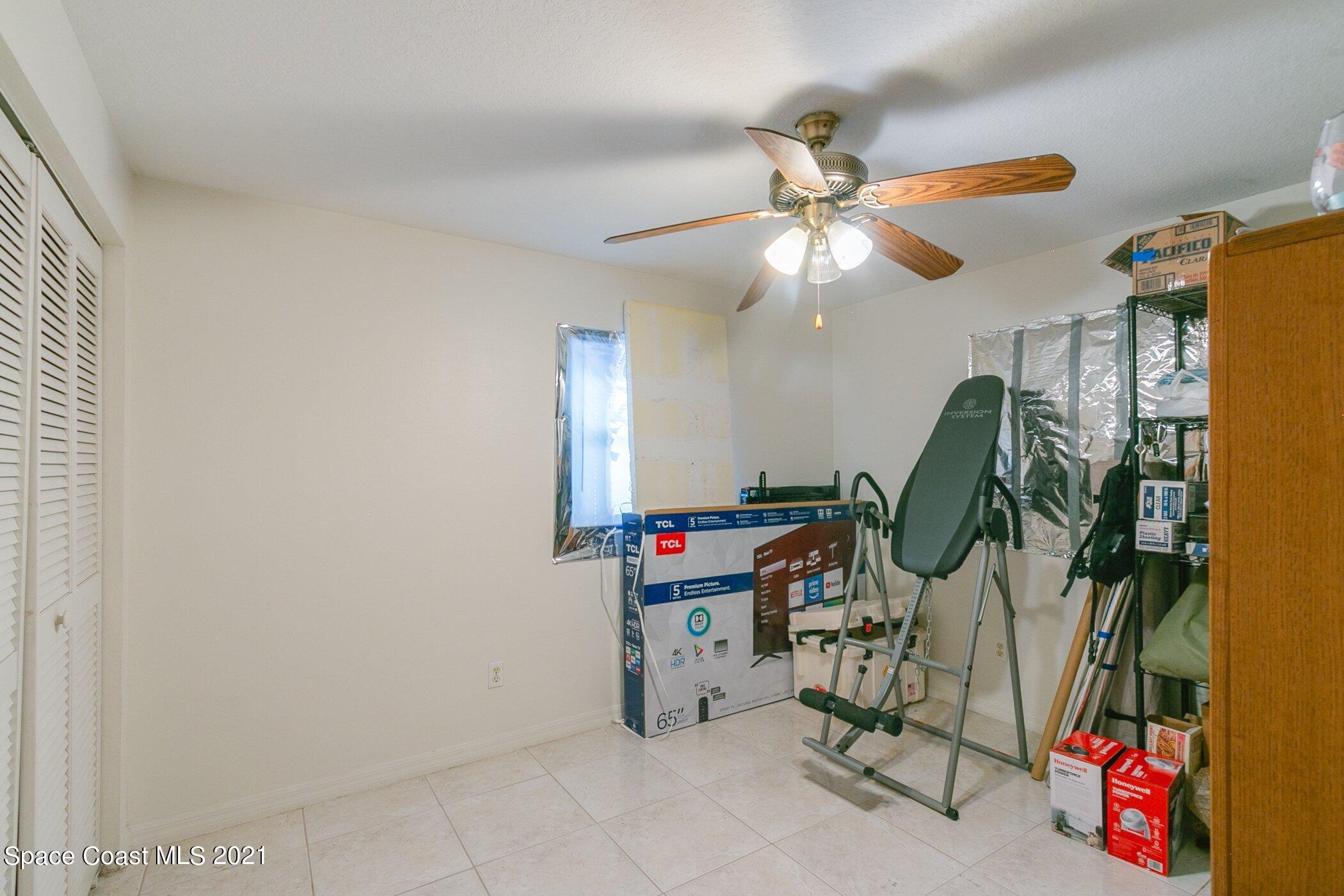 3222 Lipscomb Street Melbourne, FL 32901 - Photo 20 of 27 a view of a room with gym equipment