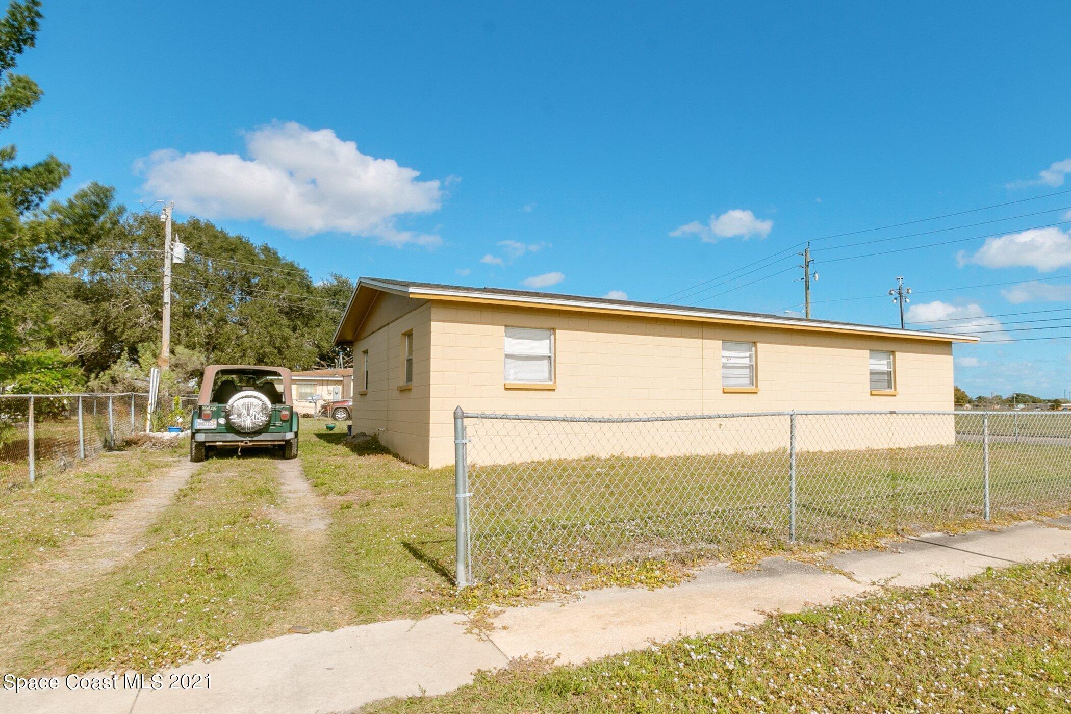 3222 Lipscomb Street Melbourne, FL 32901 - Photo 25 of 27 a view of a street with a slide