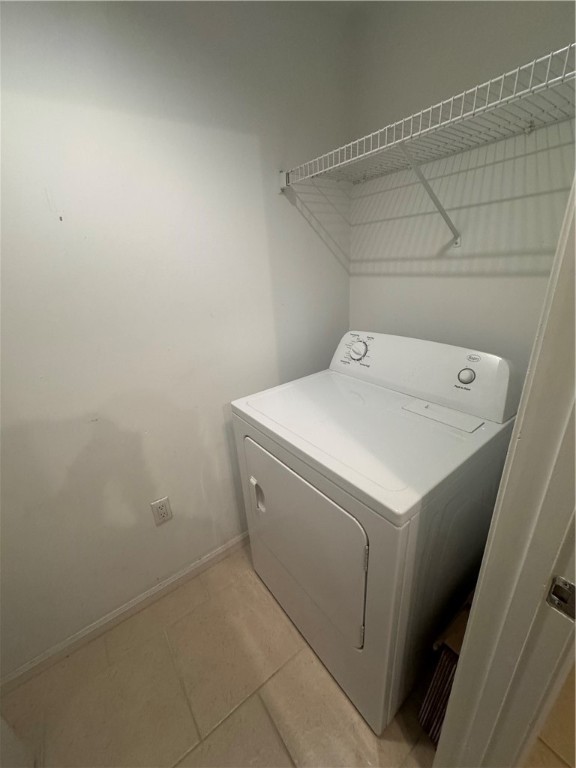 5060 Fairways Circle, Unit F207 Vero Beach, FL 32967 - Photo 14 of 14 a utility room with dryer and washer