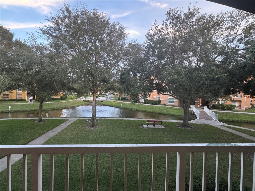 5060 Fairways Circle, Unit F207 Vero Beach, FL 32967 - Photo 8 of 14 a view of a park with large trees