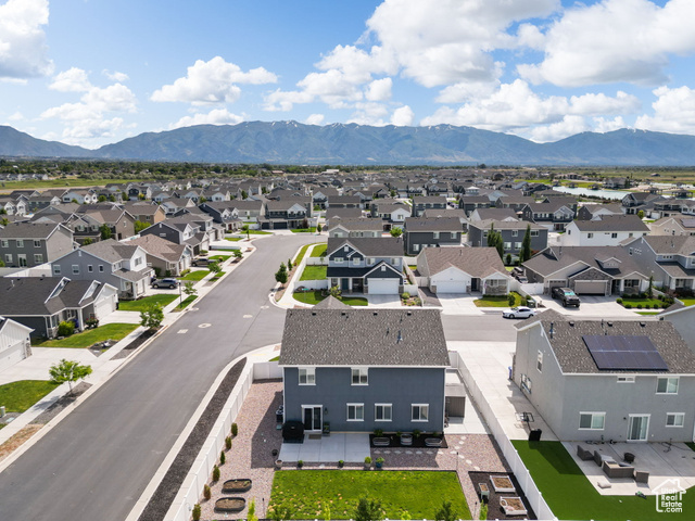 3456 South Linden Way Syracuse, UT 84075 - Photo 38 of 50 Aerial perspective of suburban area with mountains