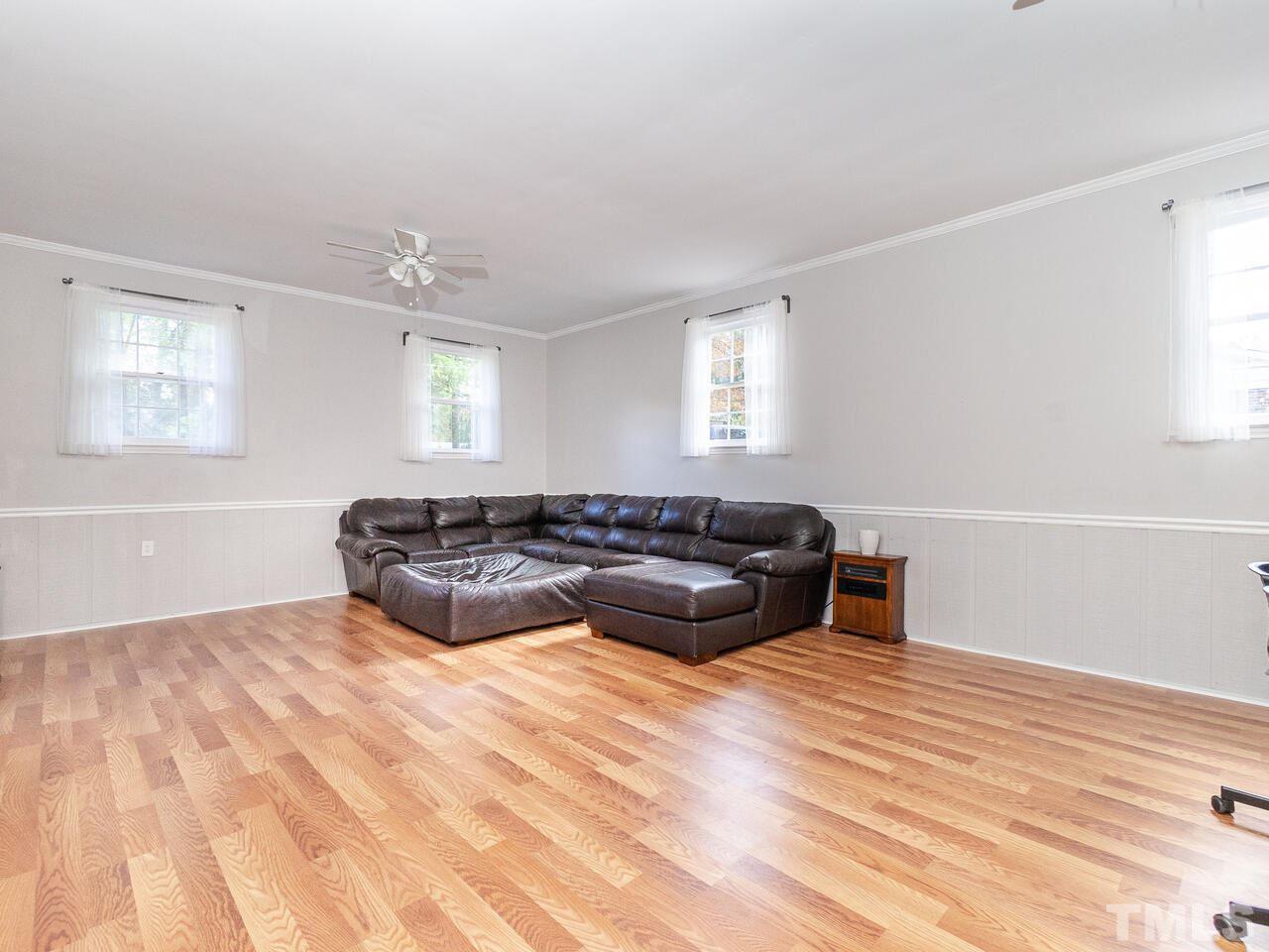 4313 Hopson Drive Raleigh, NC 27604 - Photo 14 of 30 a living room with furniture and window