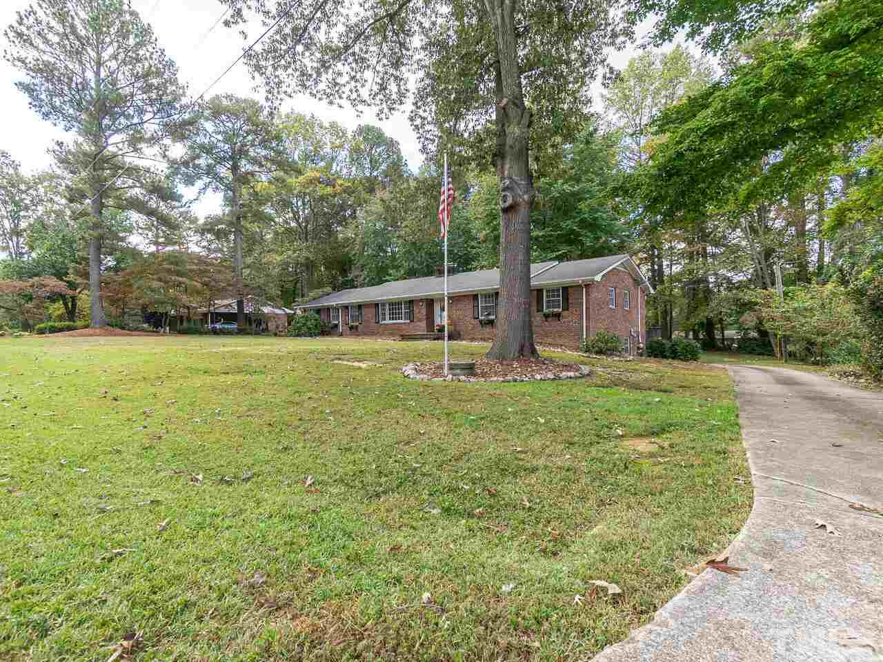 4313 Hopson Drive Raleigh, NC 27604 - Photo 3 of 30 a view of a house with yard and sitting area