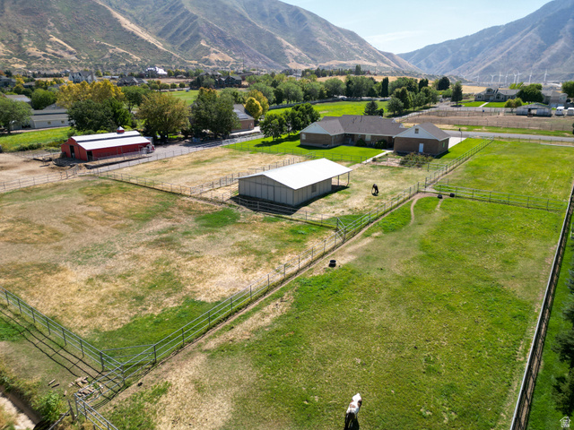 1060 West 2620th Street South Mapleton, UT 84664 - Photo 56 of 87 Aerial view of sparsely populated area featuring a mountainous background