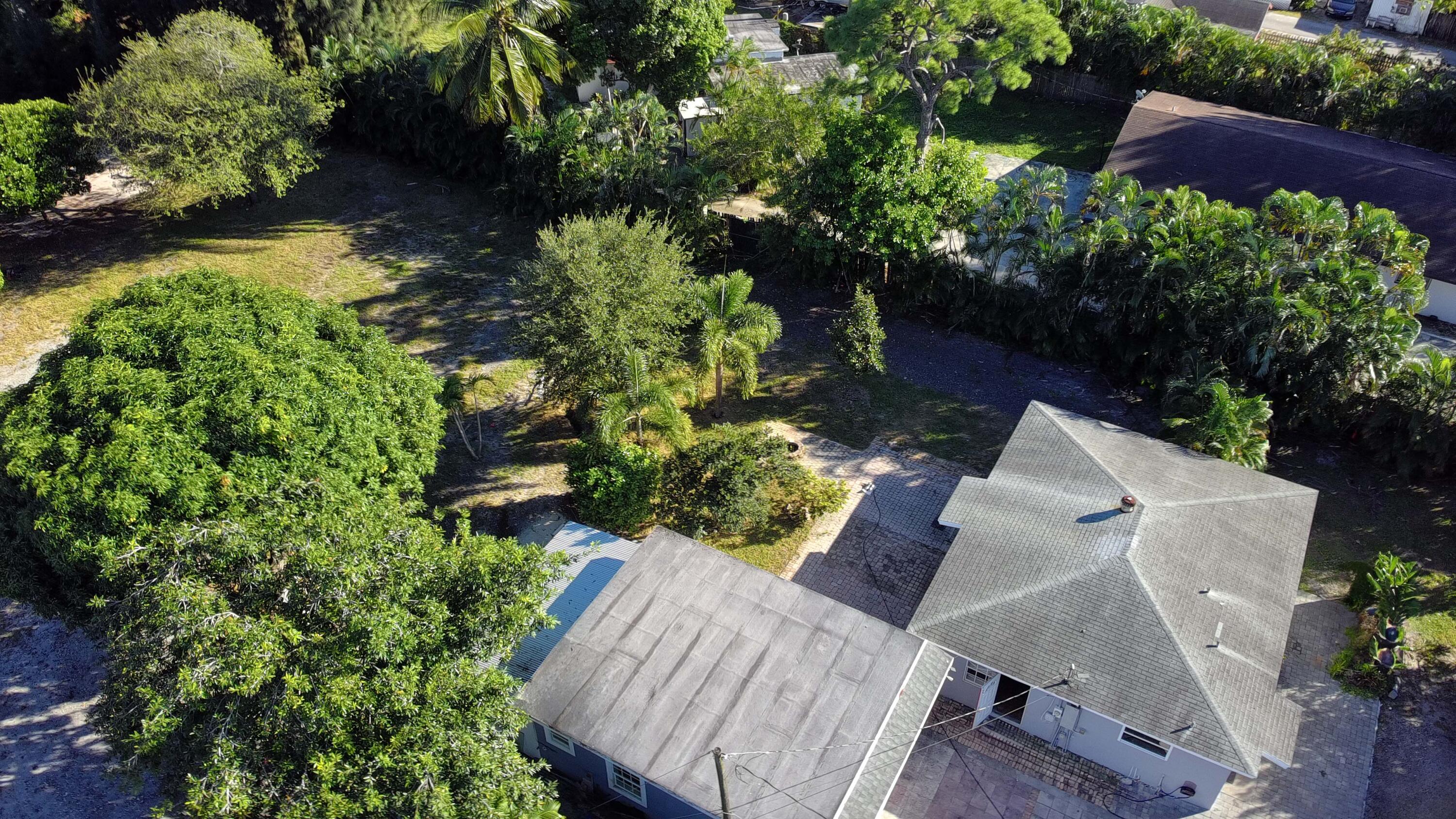 4138 Kirk Road Lake Worth, FL 33461 - Photo 2 of 9 an outdoor view with patio