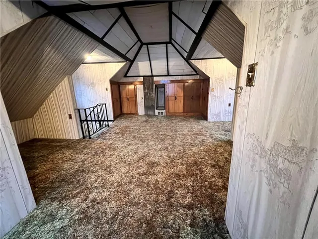 a bathroom with a toilet a sink and a mirror