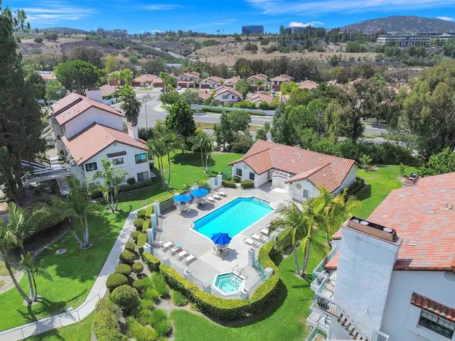an aerial view of a house with a garden