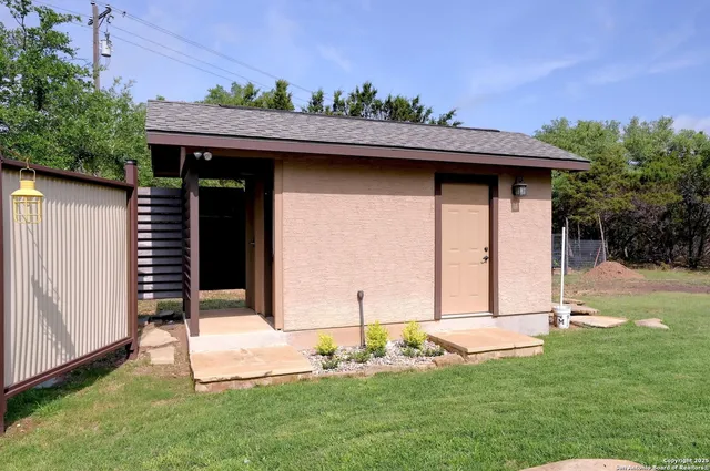 a backyard of a house with lots of green space