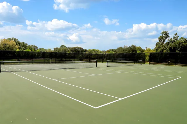 a view of a house with swimming pool