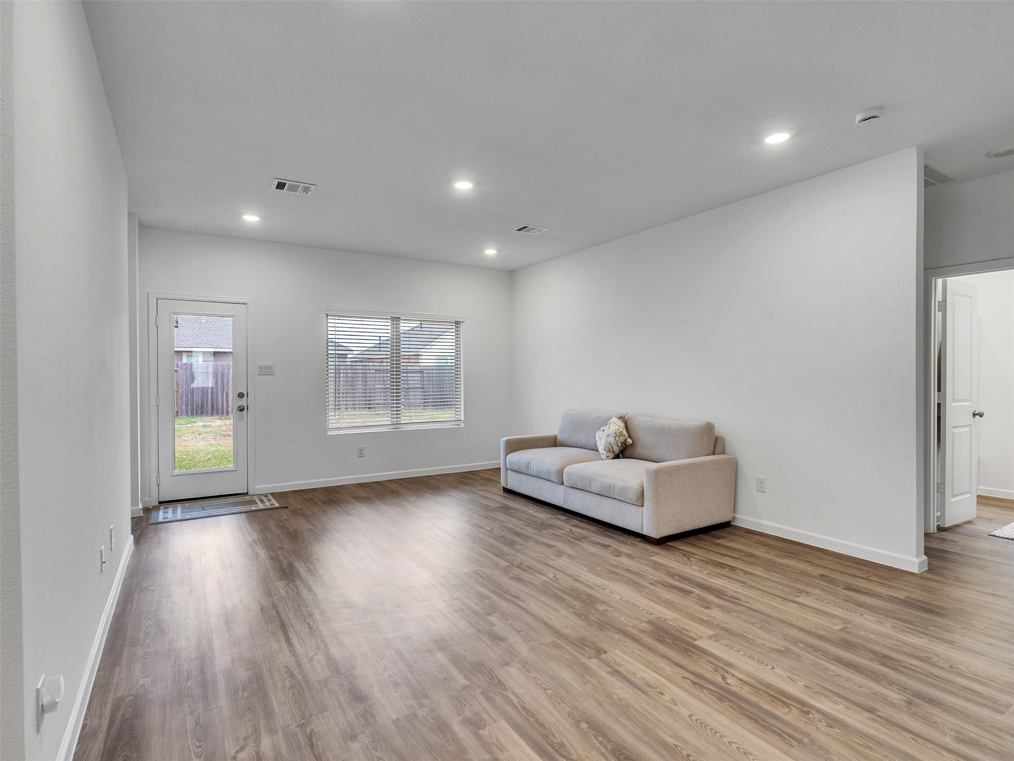 3712 Windy Brk Road Rosenberg, TX 77469 - Photo 12 of 36 a living room with furniture and wooden floor