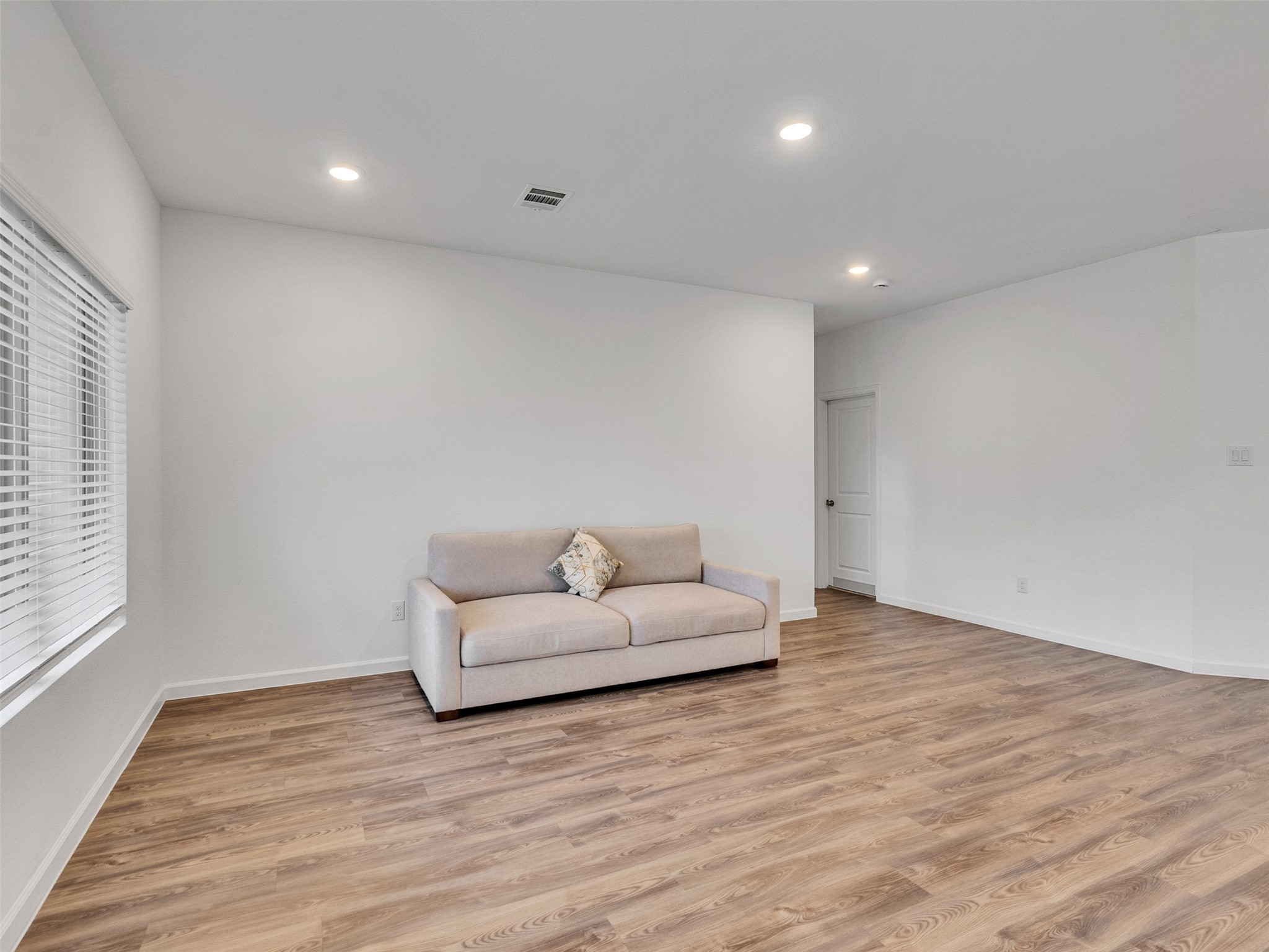 3712 Windy Brk Road Rosenberg, TX 77469 - Photo 13 of 36 a living room with hard wood floors and a hard wood floor