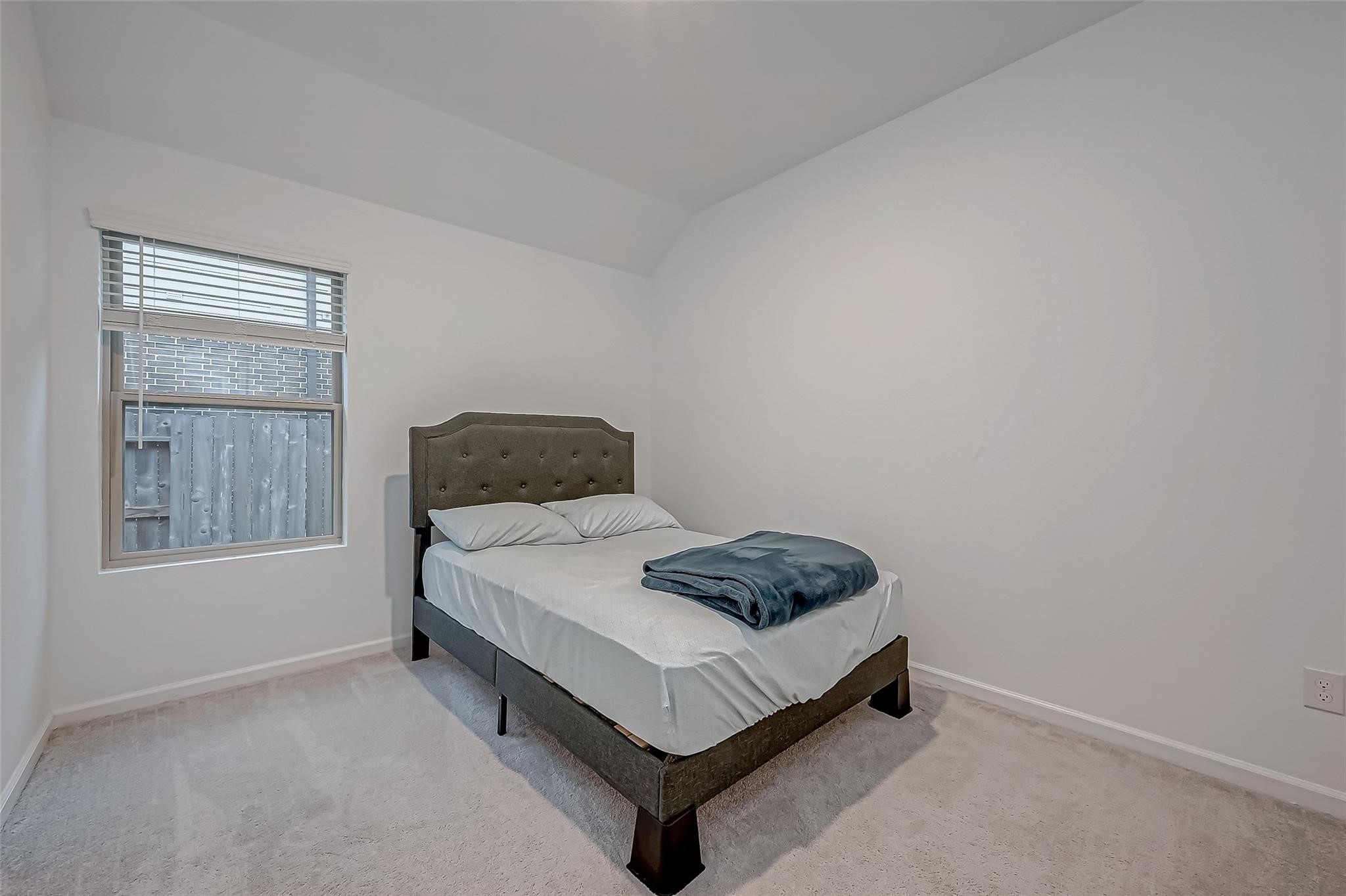 3712 Windy Brk Road Rosenberg, TX 77469 - Photo 22 of 36 a bedroom with a bed and window