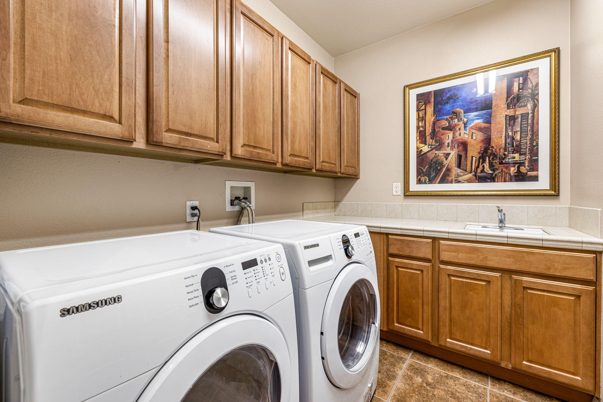 49722 Jordan Street Indio, CA 92201 - Photo 12 of 38 a utility room with dryer and washer