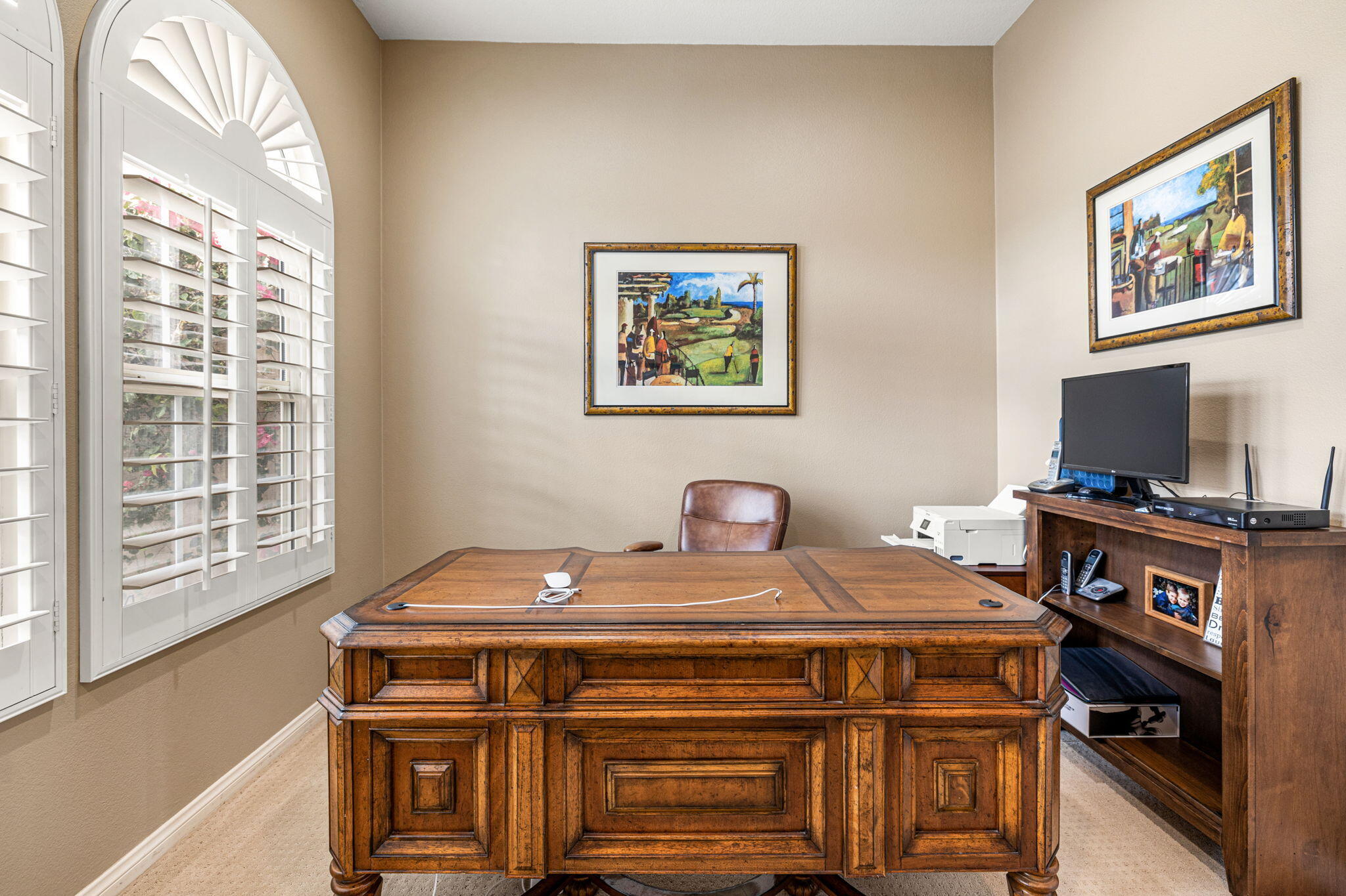 49722 Jordan Street Indio, CA 92201 - Photo 20 of 38 a room with furniture and a flat screen tv