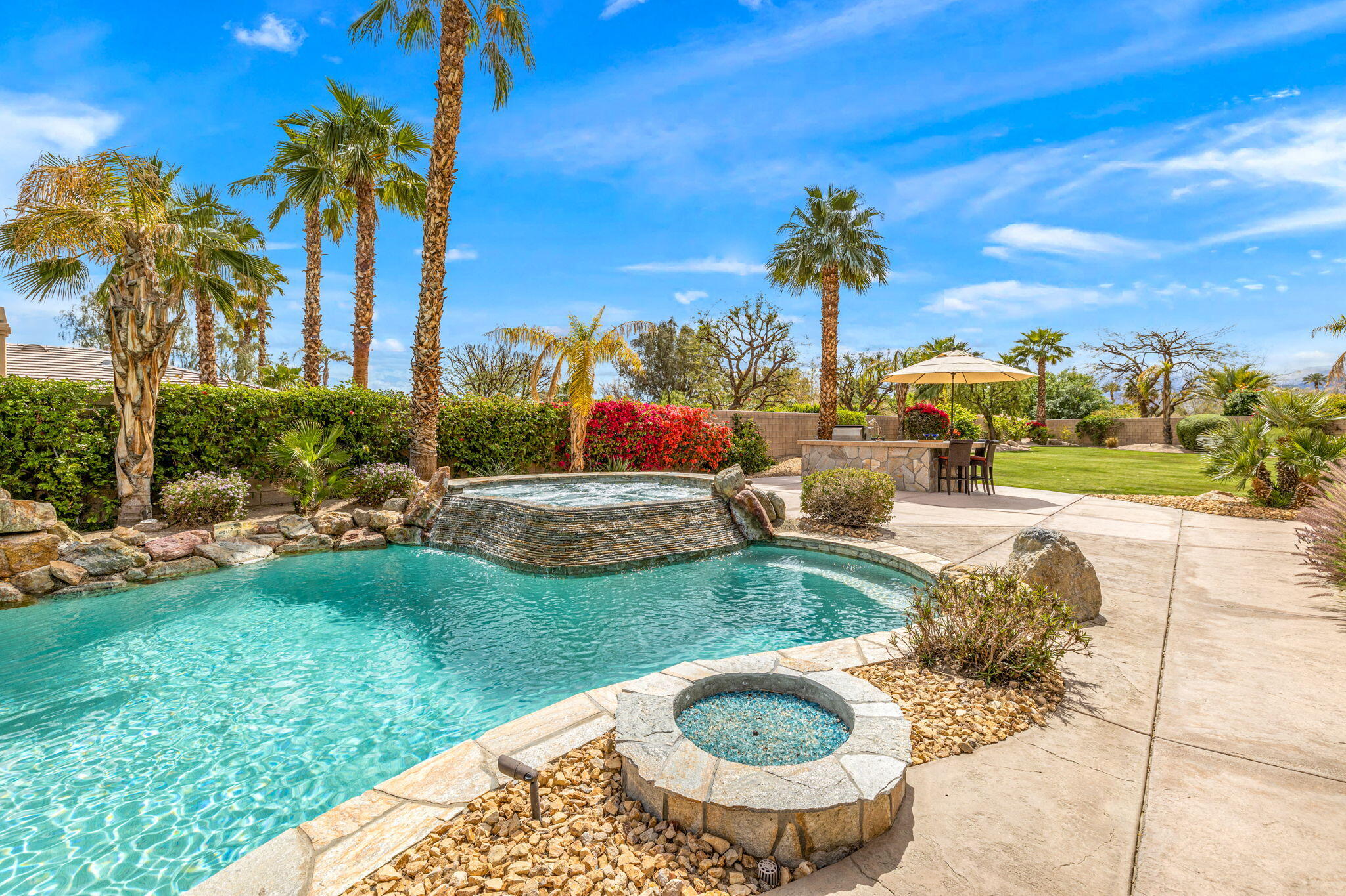49722 Jordan Street Indio, CA 92201 - Photo 24 of 38 a view of a swimming pool with a patio