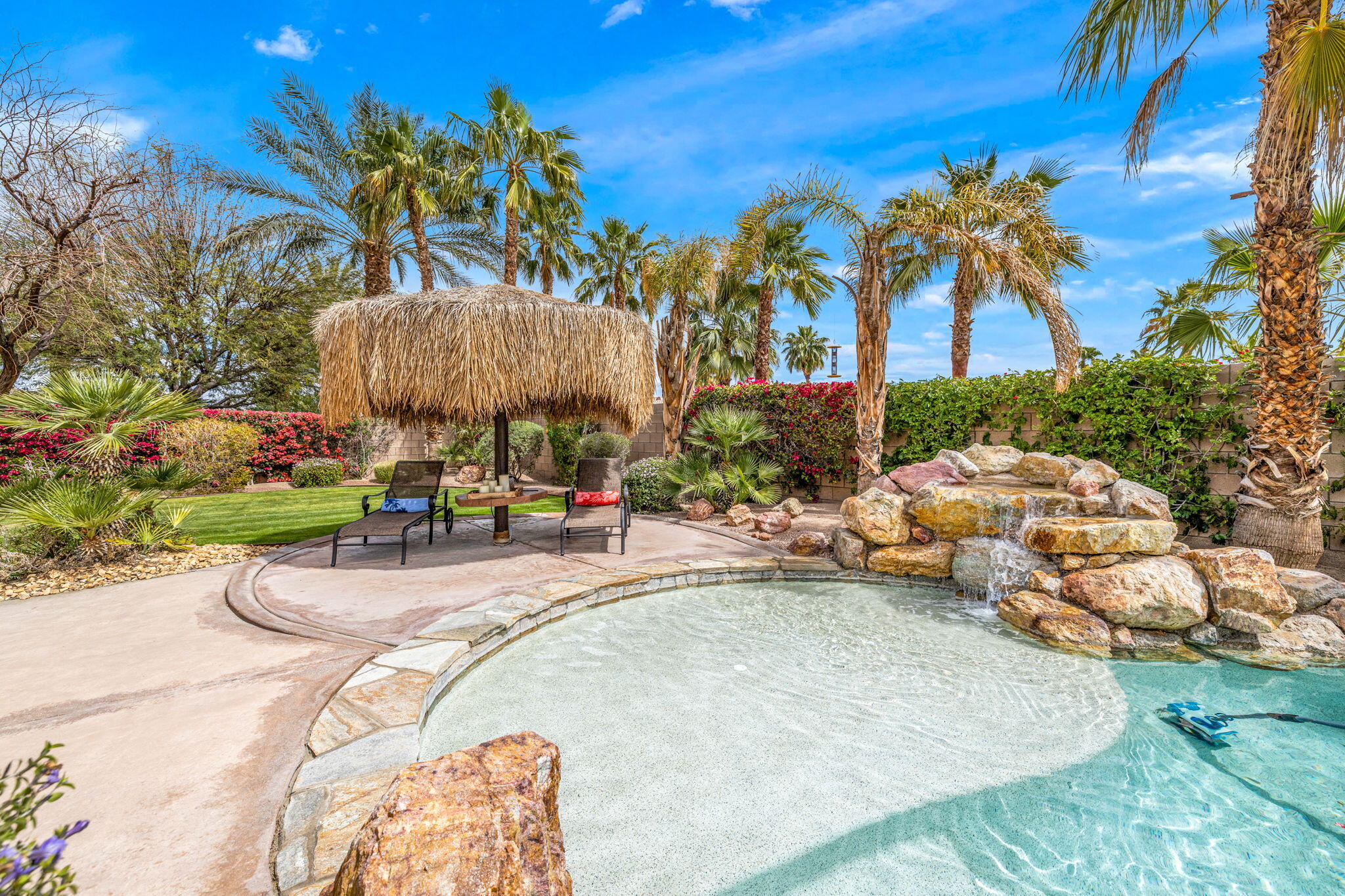 49722 Jordan Street Indio, CA 92201 - Photo 25 of 38 a view of a swimming pool and lounge chair