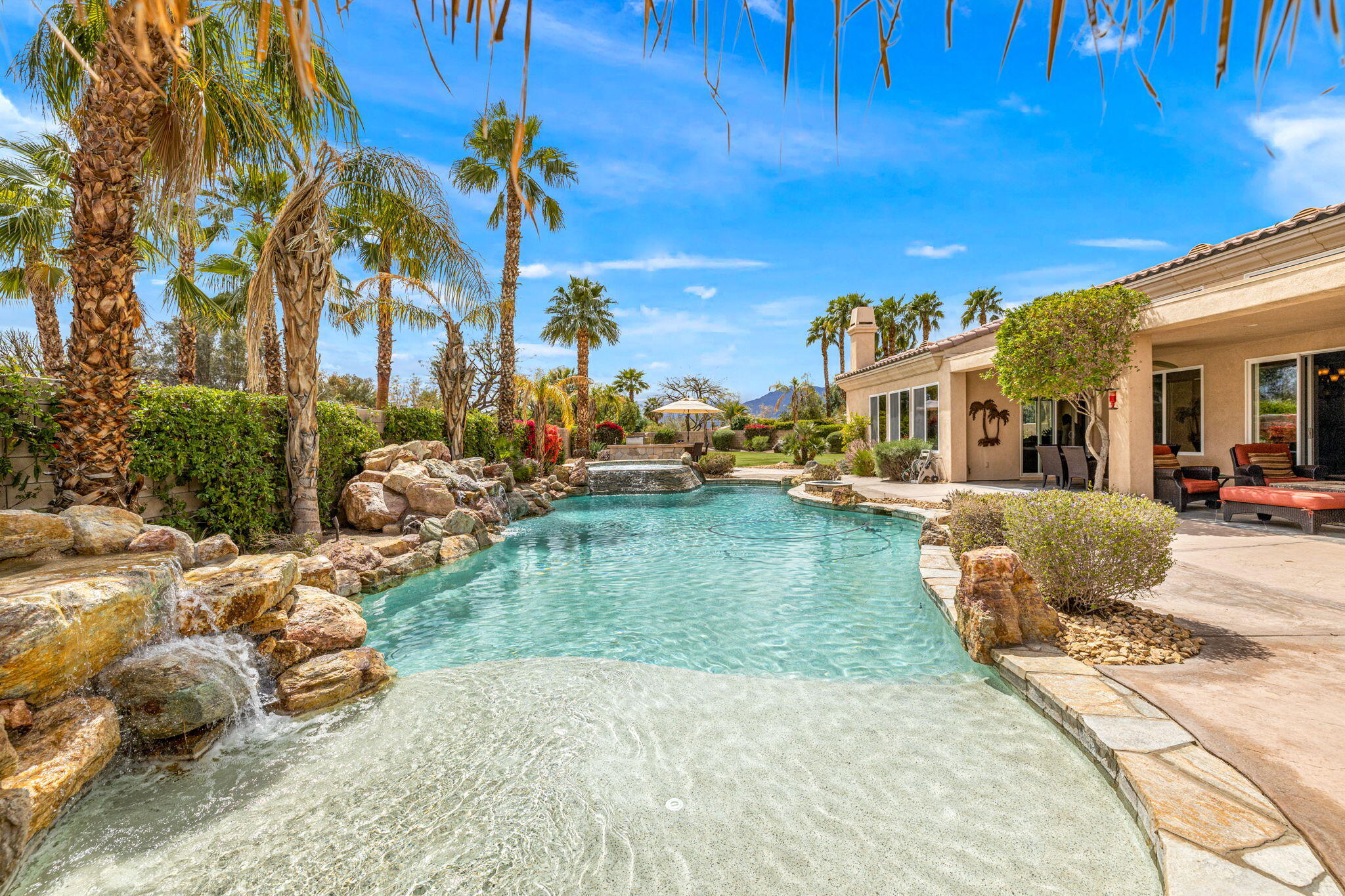 49722 Jordan Street Indio, CA 92201 - Photo 26 of 38 a view of a swimming pool with a patio