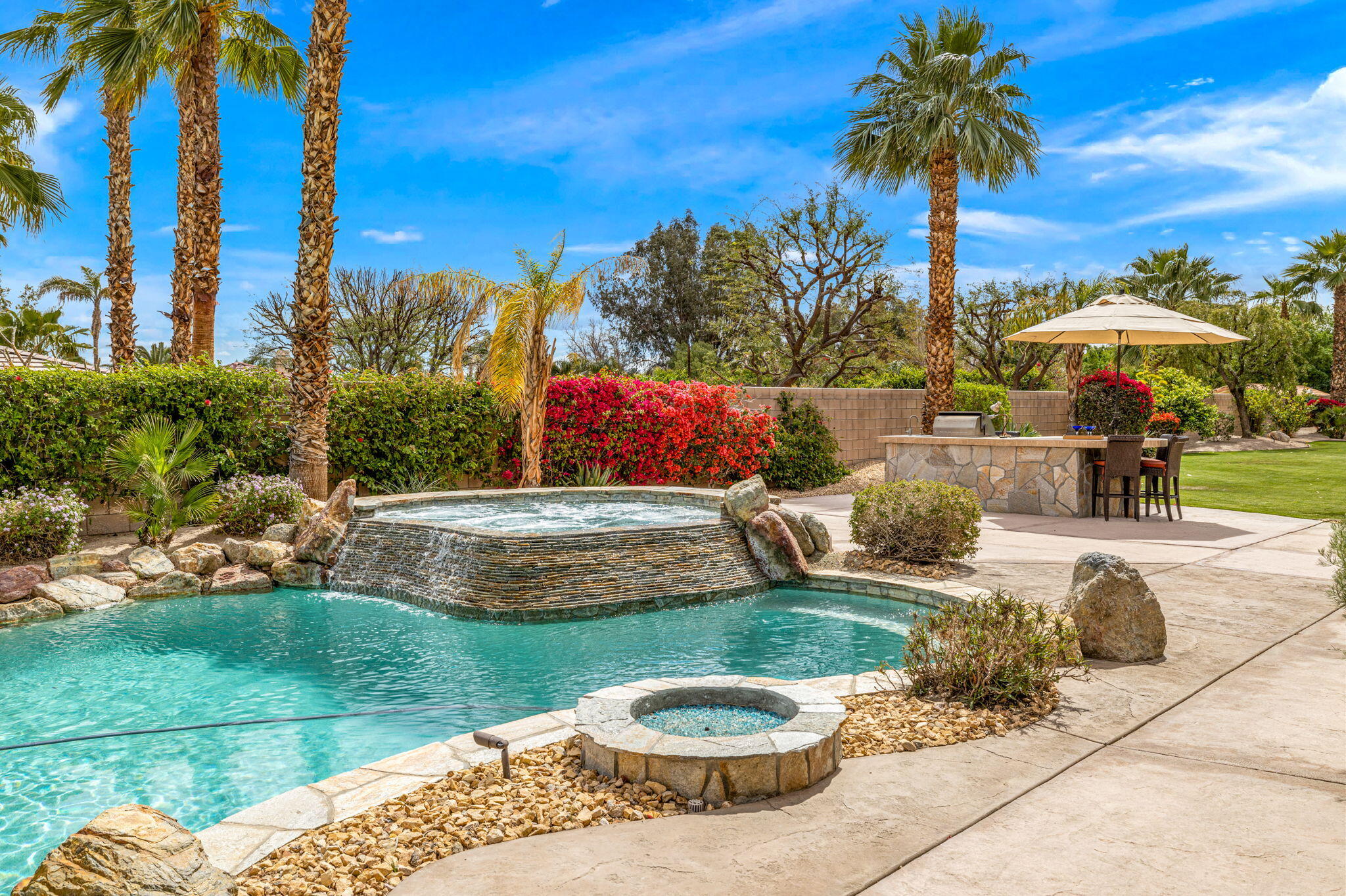 49722 Jordan Street Indio, CA 92201 - Photo 28 of 38 a view of a backyard with a garden and plants