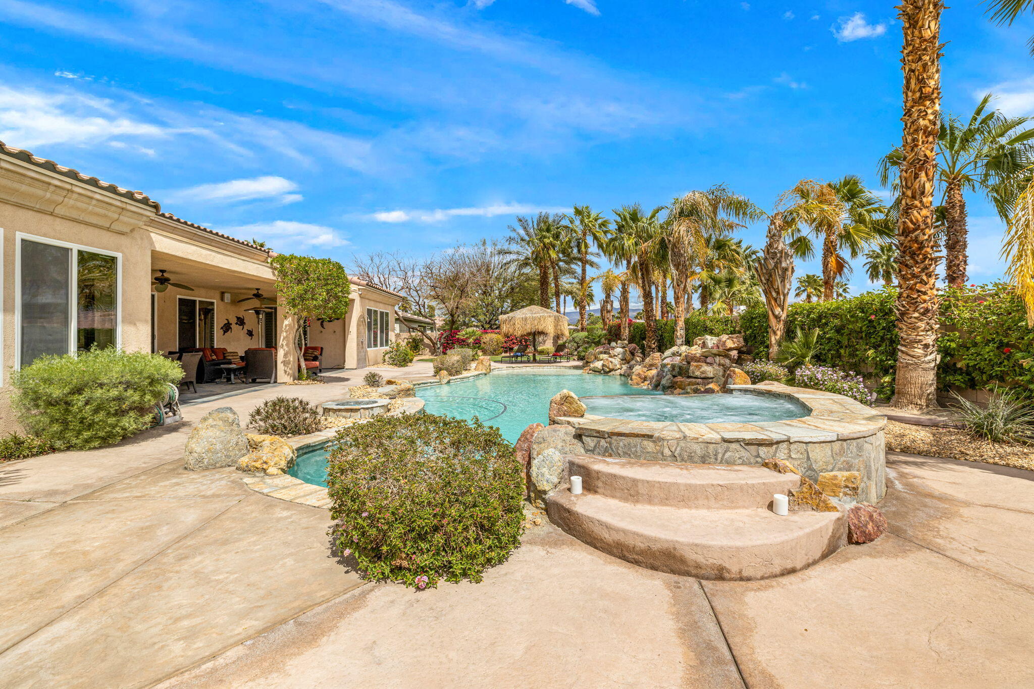 49722 Jordan Street Indio, CA 92201 - Photo 29 of 38 a view of a swimming pool with an outdoor seating