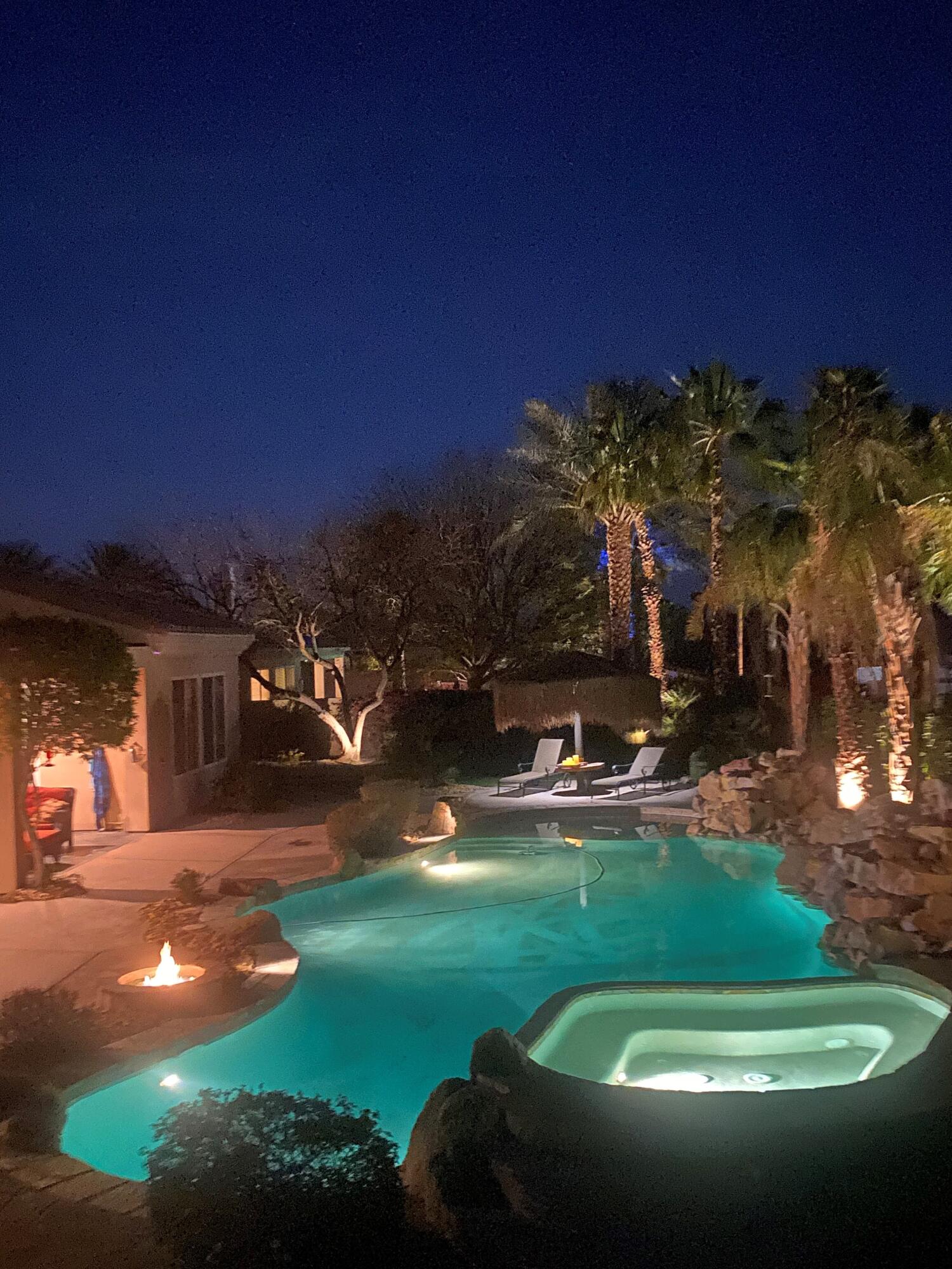 49722 Jordan Street Indio, CA 92201 - Photo 32 of 38 a view of a house with a swimming pool