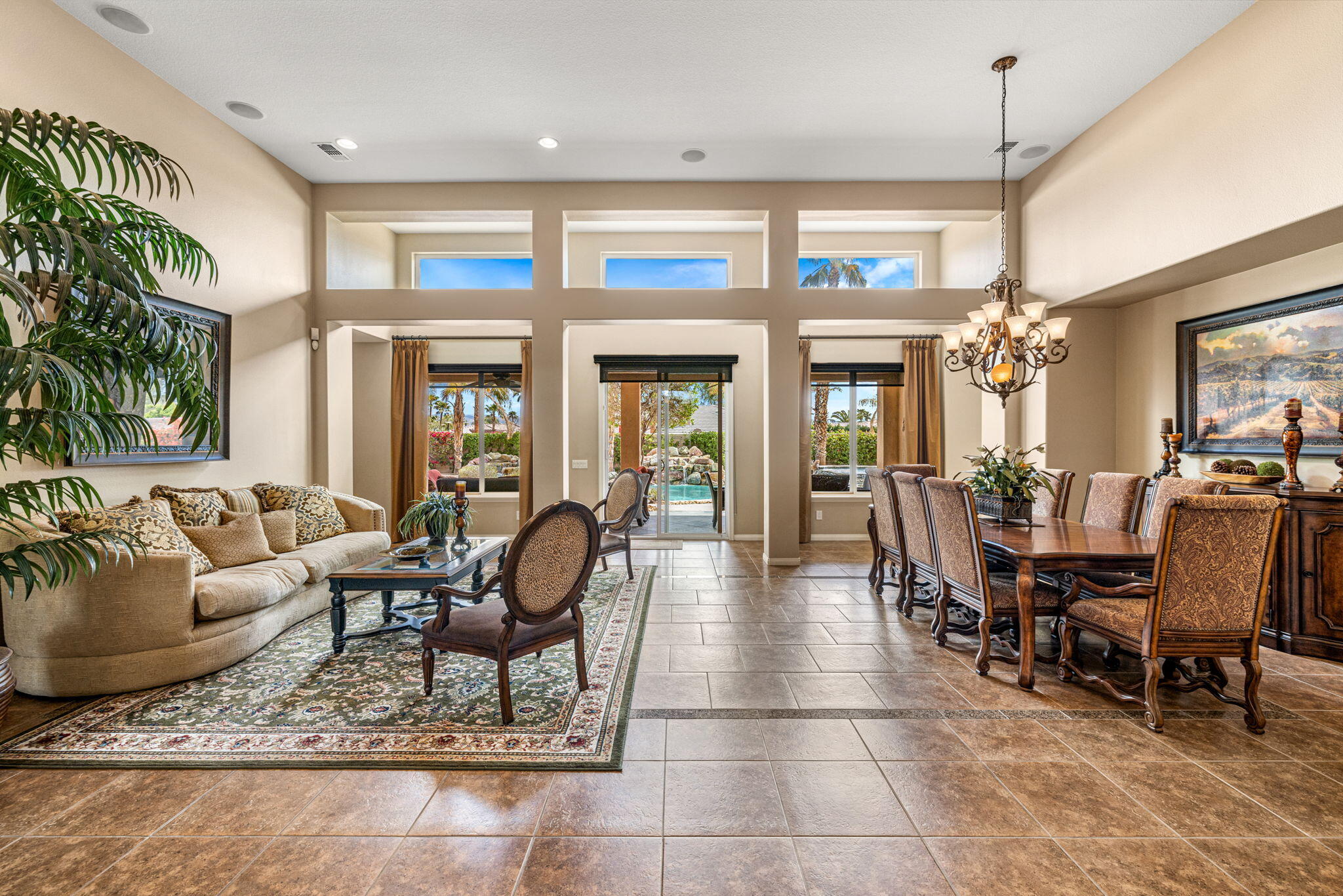 49722 Jordan Street Indio, CA 92201 - Photo 4 of 38 a living room with furniture and a chandelier