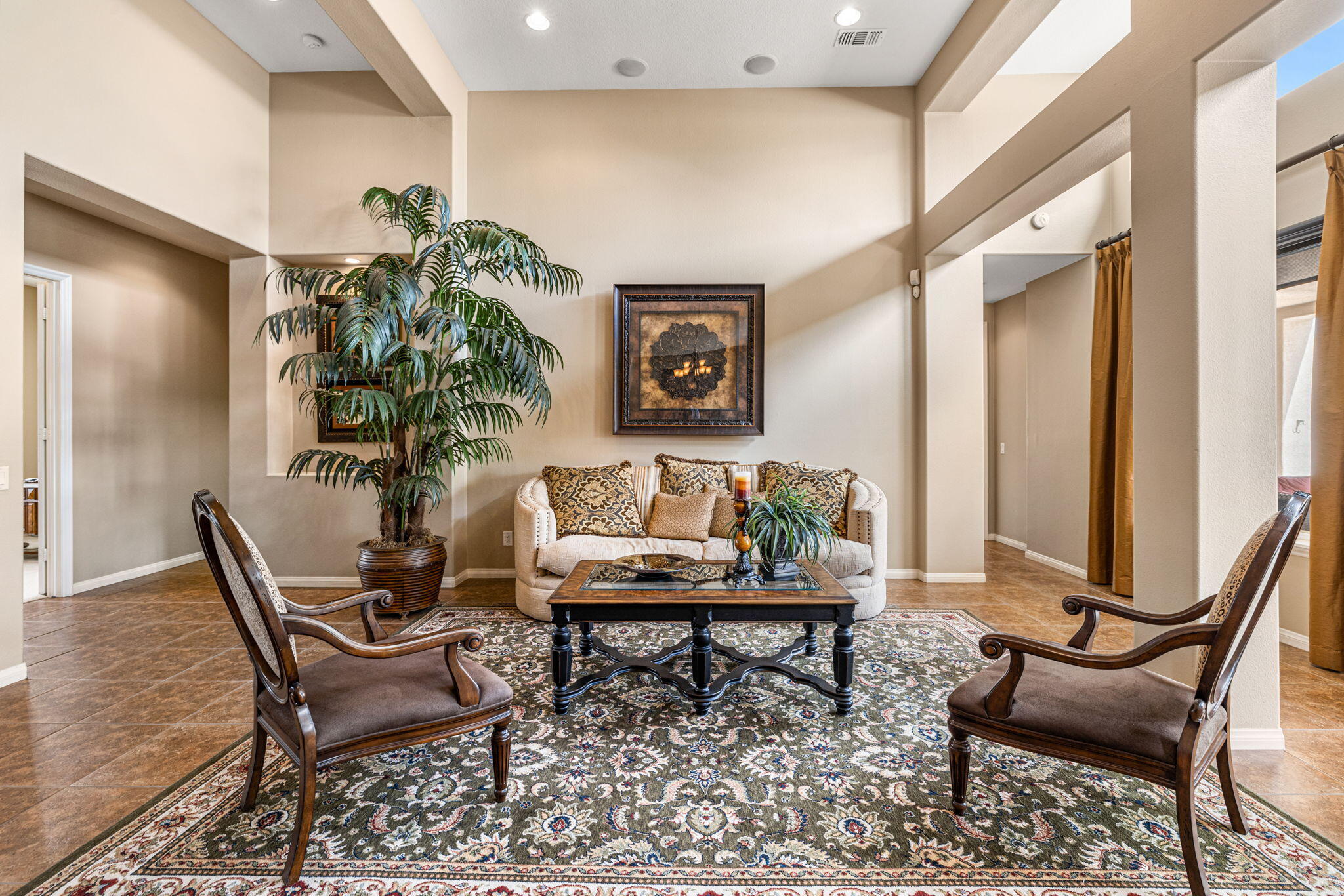 49722 Jordan Street Indio, CA 92201 - Photo 5 of 38 a workspace with furniture and a potted plant