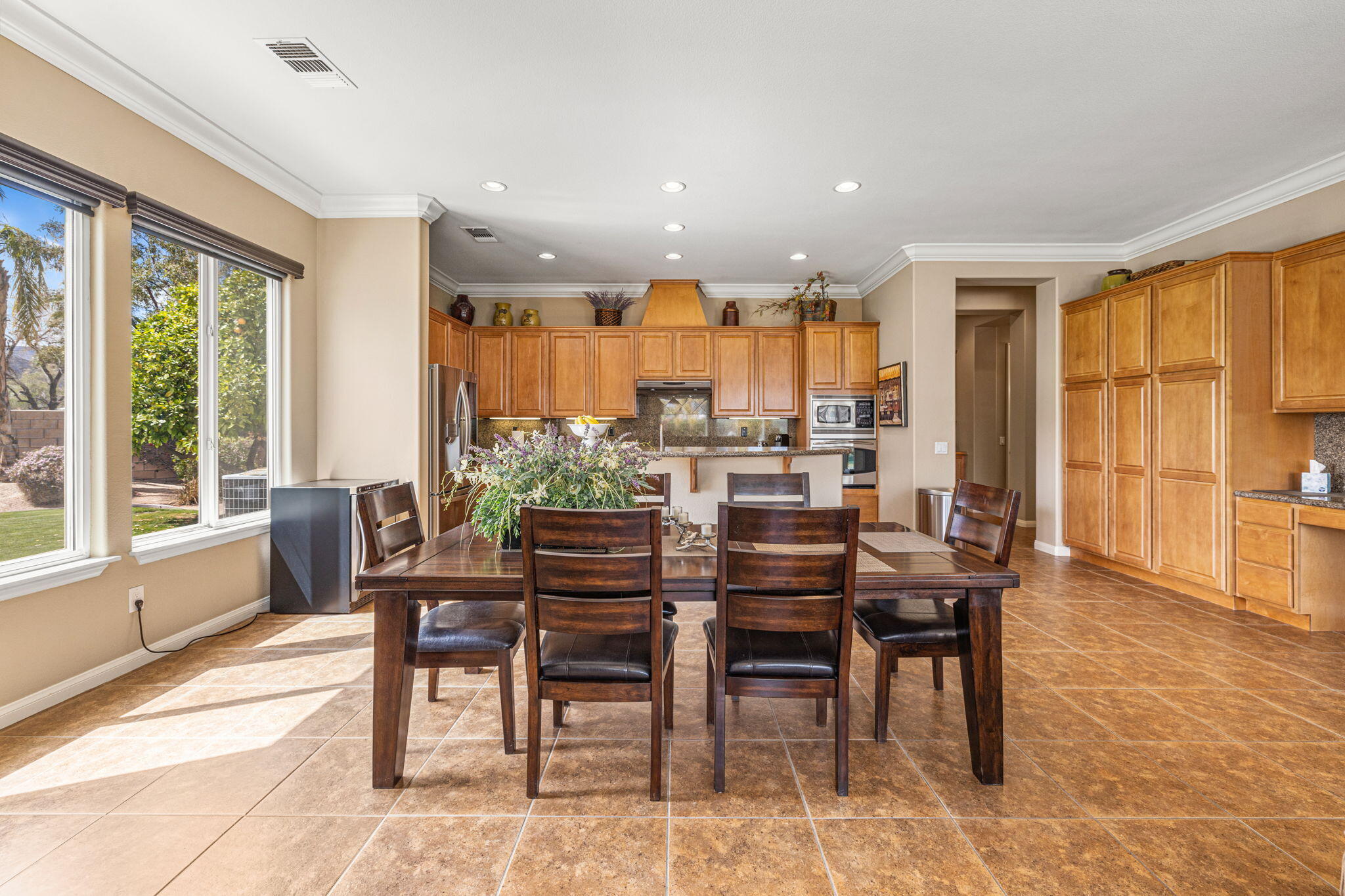 49722 Jordan Street Indio, CA 92201 - Photo 9 of 38 a view of a dining room with furniture window and outside view