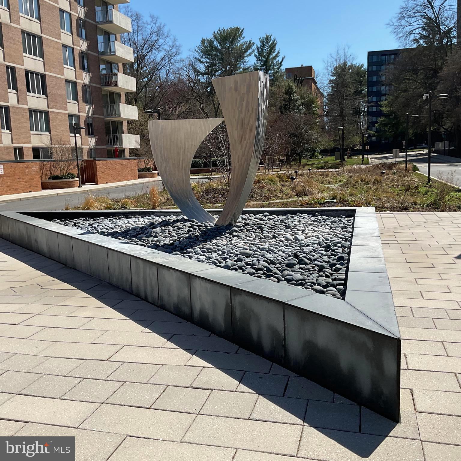 2939 Van Ness Street Northwest, Unit 731 Washington, DC 20008 - Photo 3 of 14 a view of a terrace with wooden fence