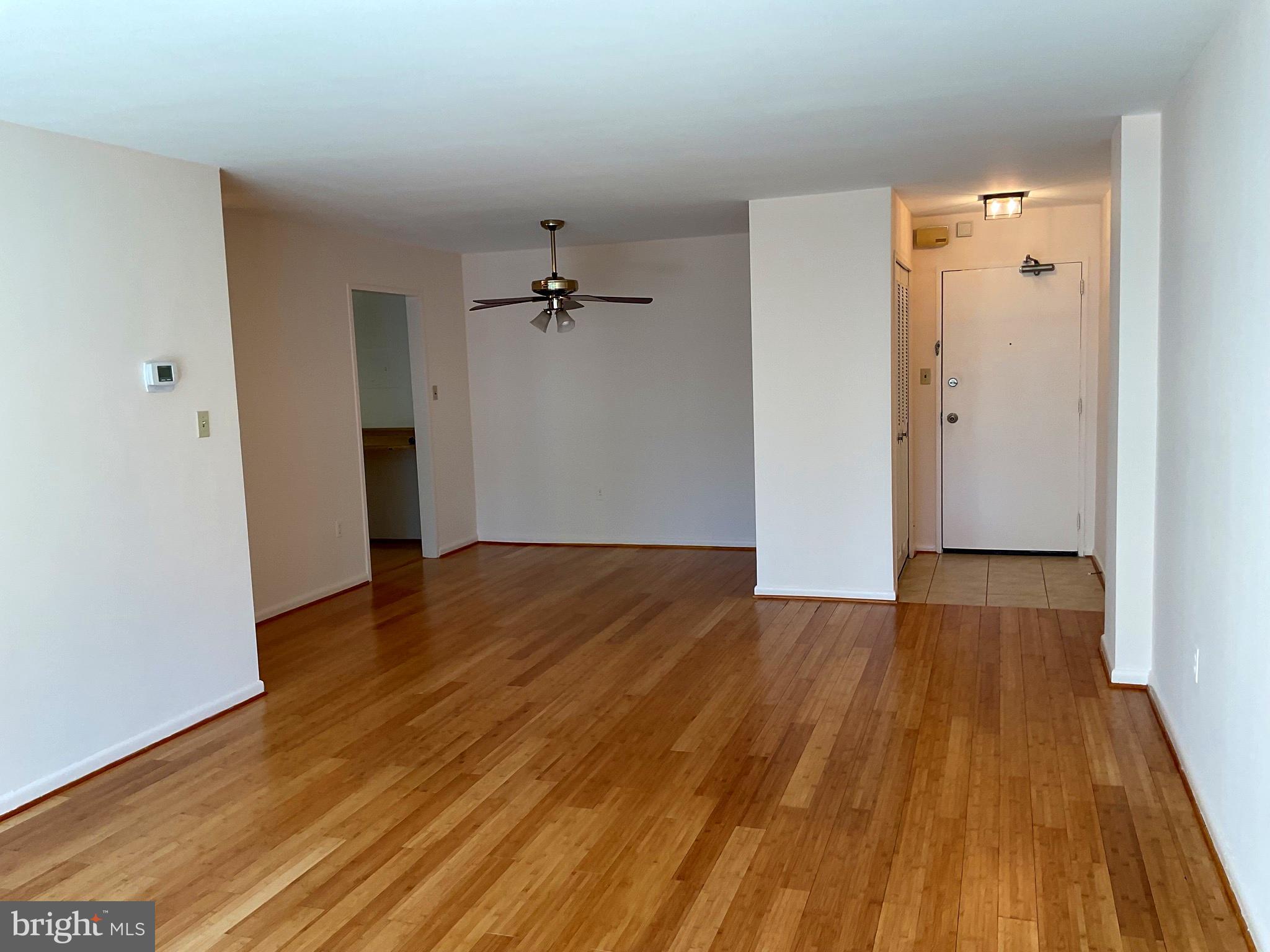 2939 Van Ness Street Northwest, Unit 731 Washington, DC 20008 - Photo 6 of 14 wooden floor in an empty room