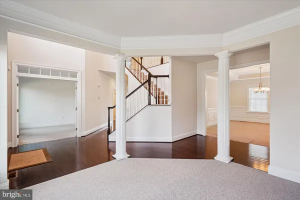 a bedroom with a bed and a mirror