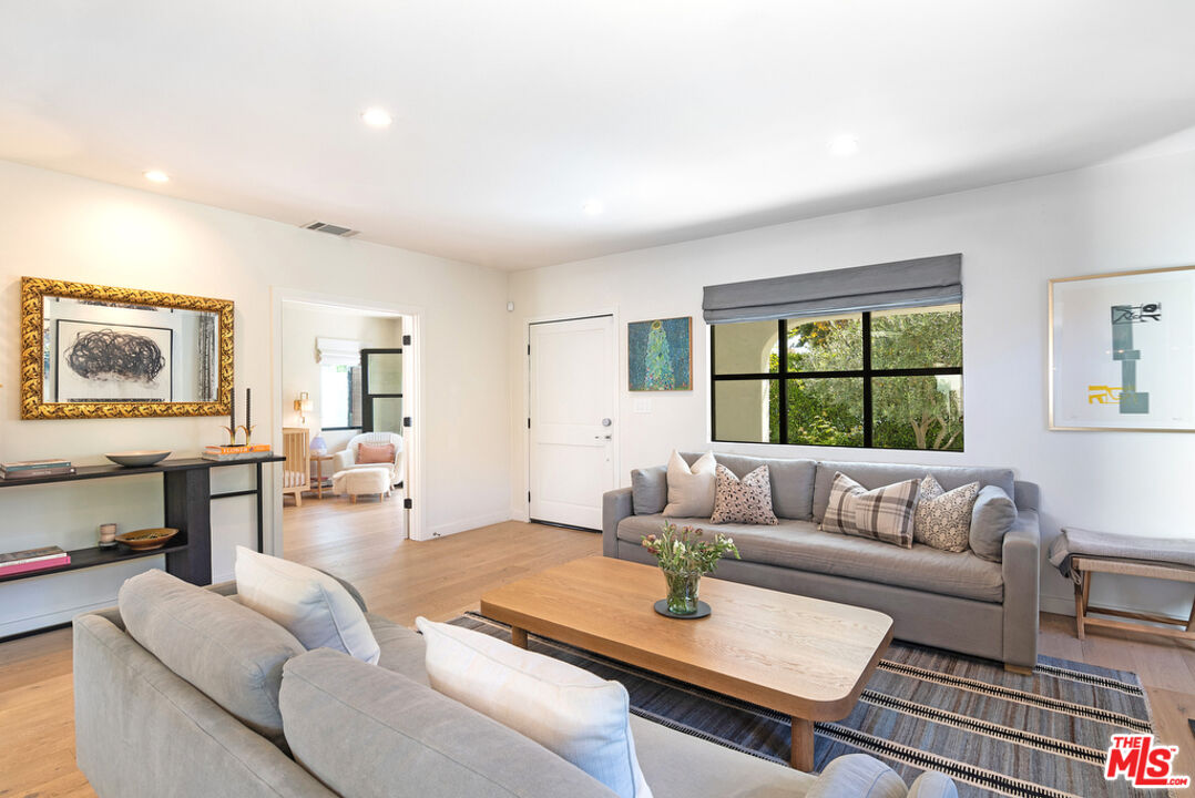 743 North June Street Los Angeles, CA 90038 - Photo 11 of 38 a living room with furniture and a window