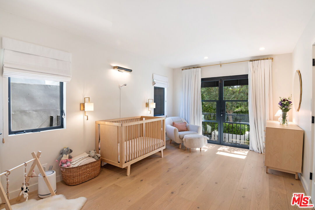 743 North June Street Los Angeles, CA 90038 - Photo 24 of 38 a living room with furniture and a large window