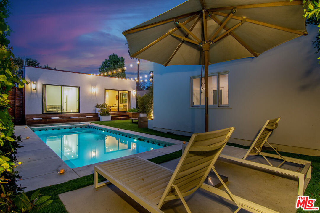 743 North June Street Los Angeles, CA 90038 - Photo 31 of 38 a view of a patio with swimming pool table and chairs