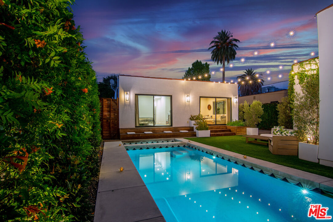 743 North June Street Los Angeles, CA 90038 - Photo 32 of 38 a view of a house with swimming pool and sitting area