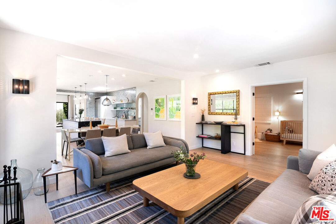 743 North June Street Los Angeles, CA 90038 - Photo 9 of 38 a living room with furniture