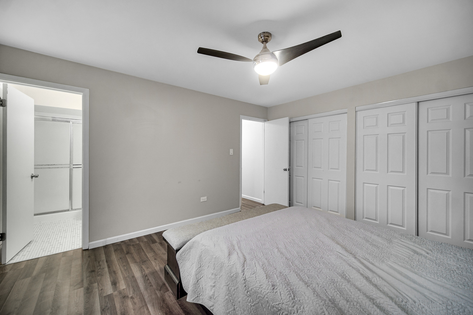 1133 South Finley Road, Unit 310 Lombard, IL 60148 - Photo 13 of 22 a view of empty room with wooden floor and fan