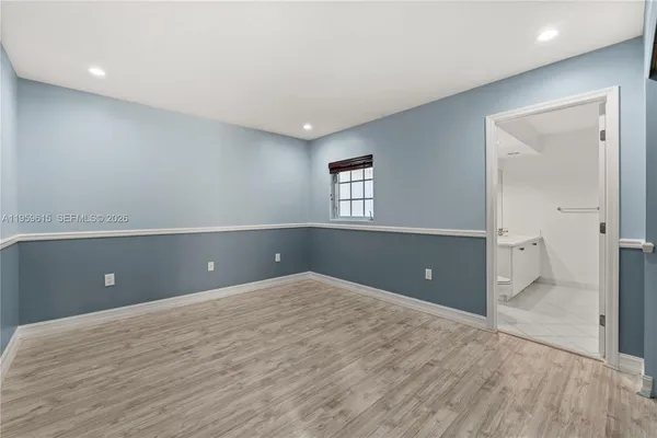 wooden floor and cabinet in a room