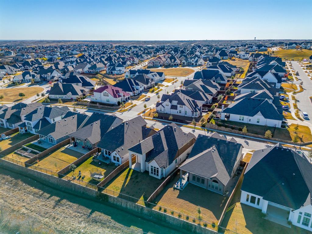 14328 Capridge Road Fort Worth, TX 76008 - Photo 29 of 39 an aerial view of residential houses with outdoor space