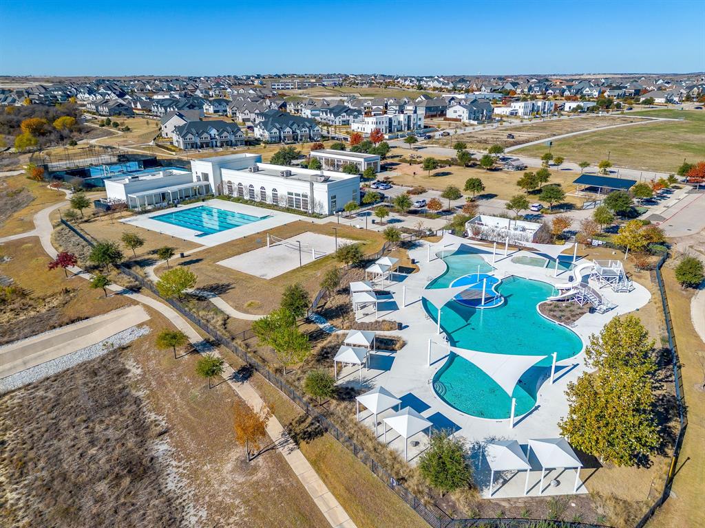 14328 Capridge Road Fort Worth, TX 76008 - Photo 30 of 39 an aerial view of residential houses with outdoor space