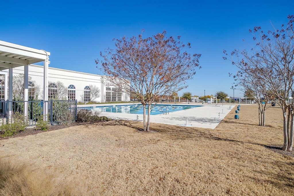 14328 Capridge Road Fort Worth, TX 76008 - Photo 32 of 39 a view of backyard of a house