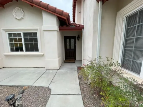 a view of entrance of house and front door