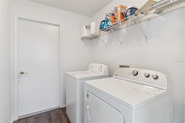 a utility room with dryer and washer