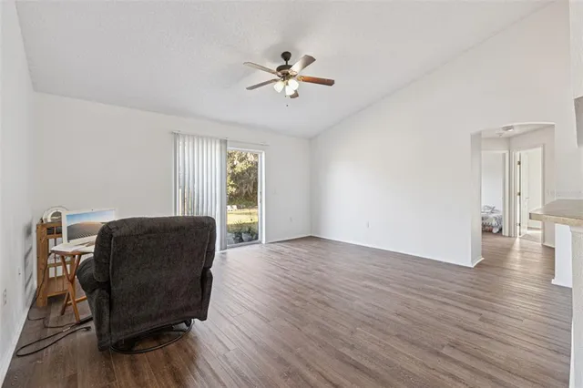 a living room with furniture and a window