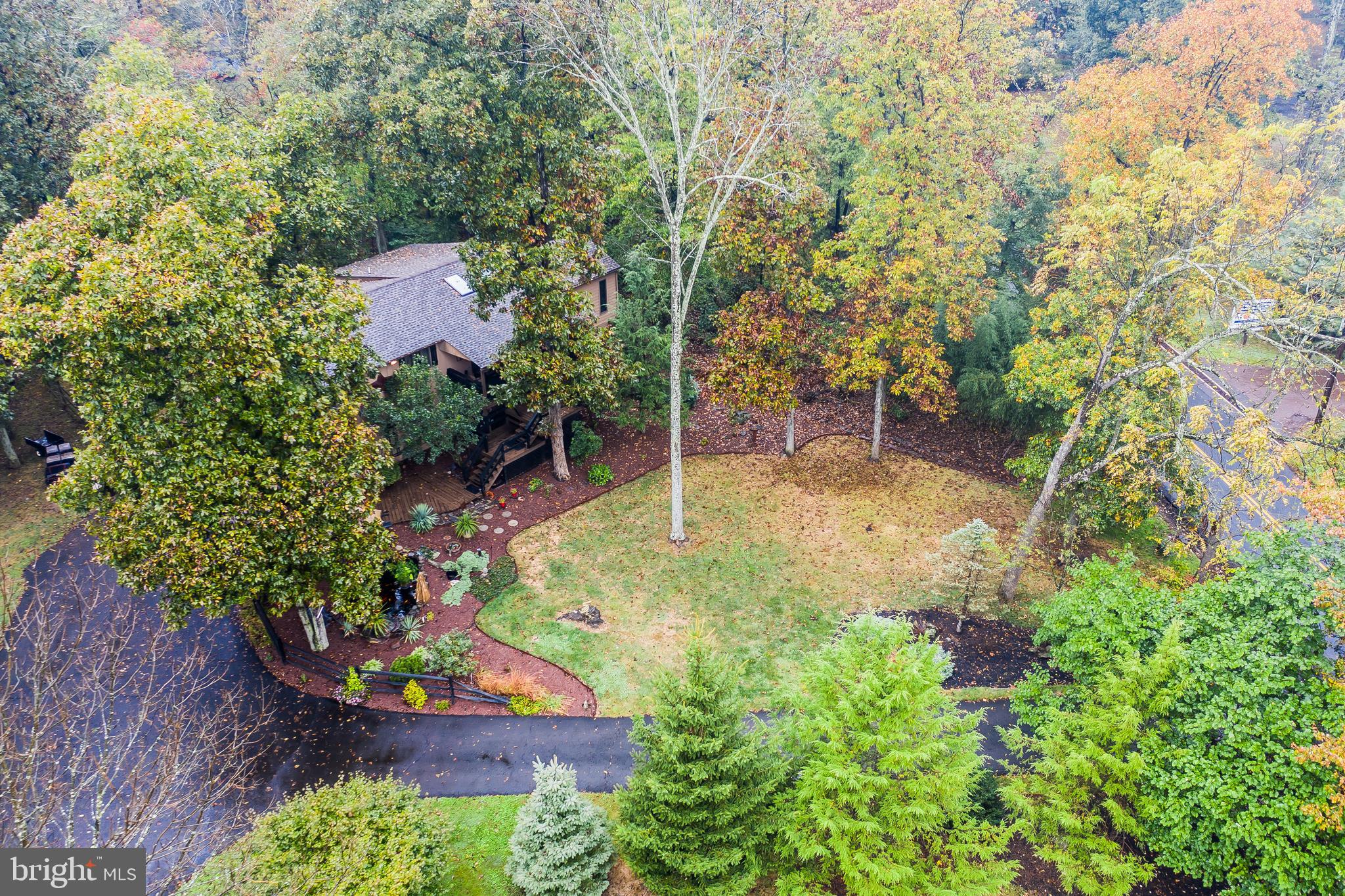 948 Callowhill Road Perkasie, PA 18944 - Photo 27 of 29 a view of a garden with a bench