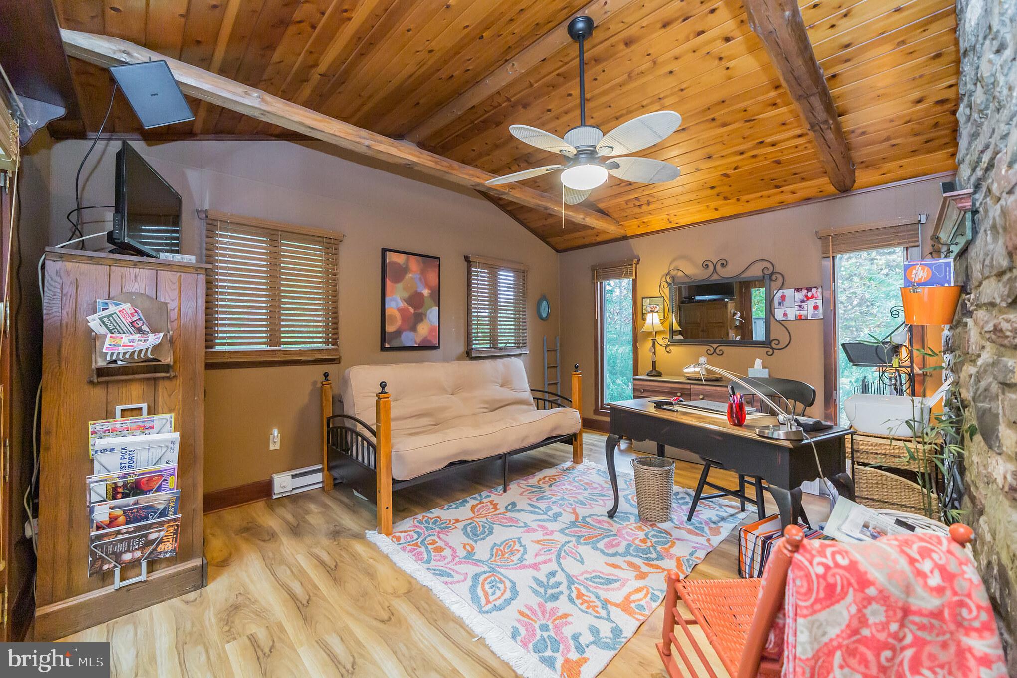 948 Callowhill Road Perkasie, PA 18944 - Photo 8 of 29 a living room with furniture and a flat screen tv