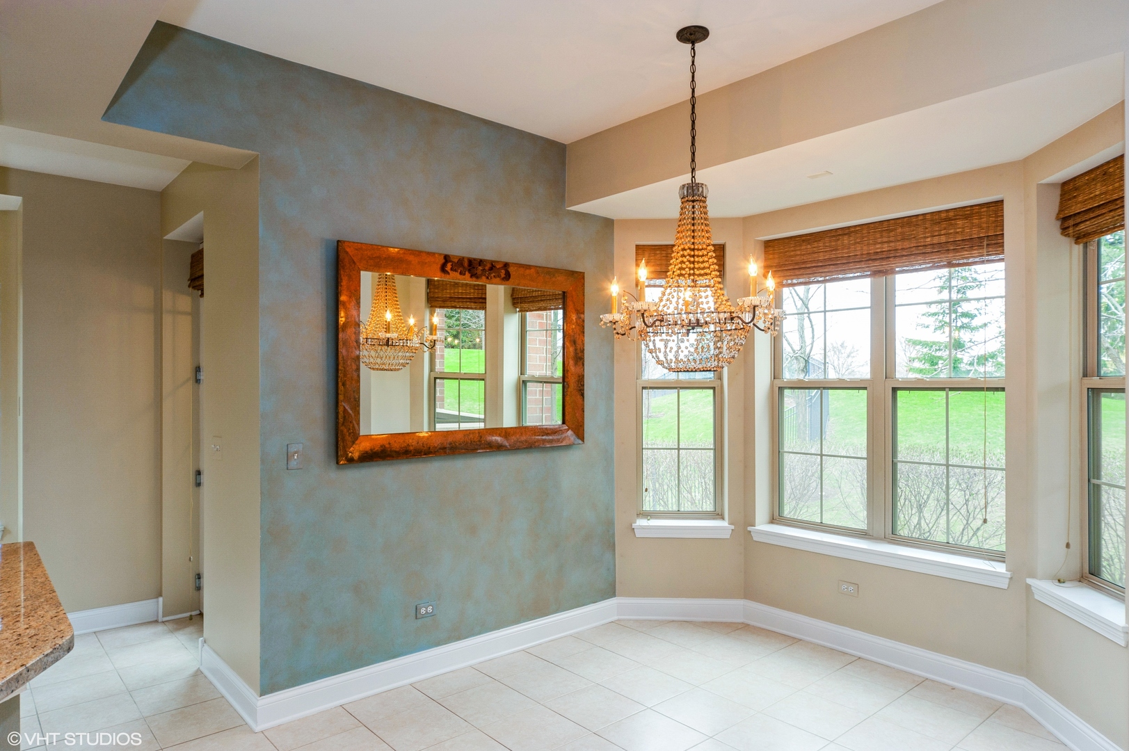 2700 Summit Drive, Unit 101 Glenview, IL 60025 - Photo 6 of 14 a dining room with chandelier and windows