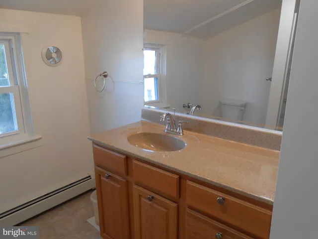 a sink with a mirror